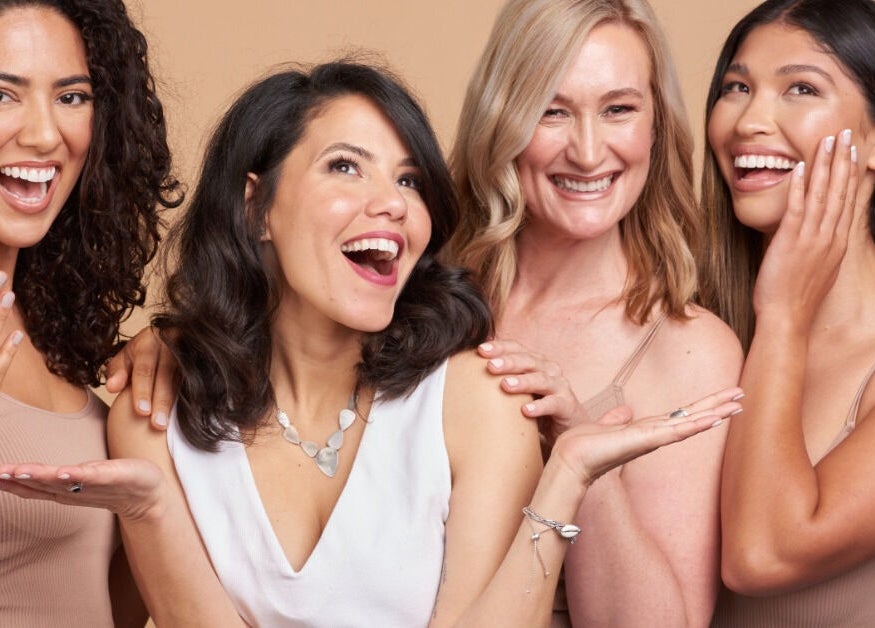 Smiling women with manicured nails at Daline Nails, Dee Why, New South Wales, AU enjoying beauty services.