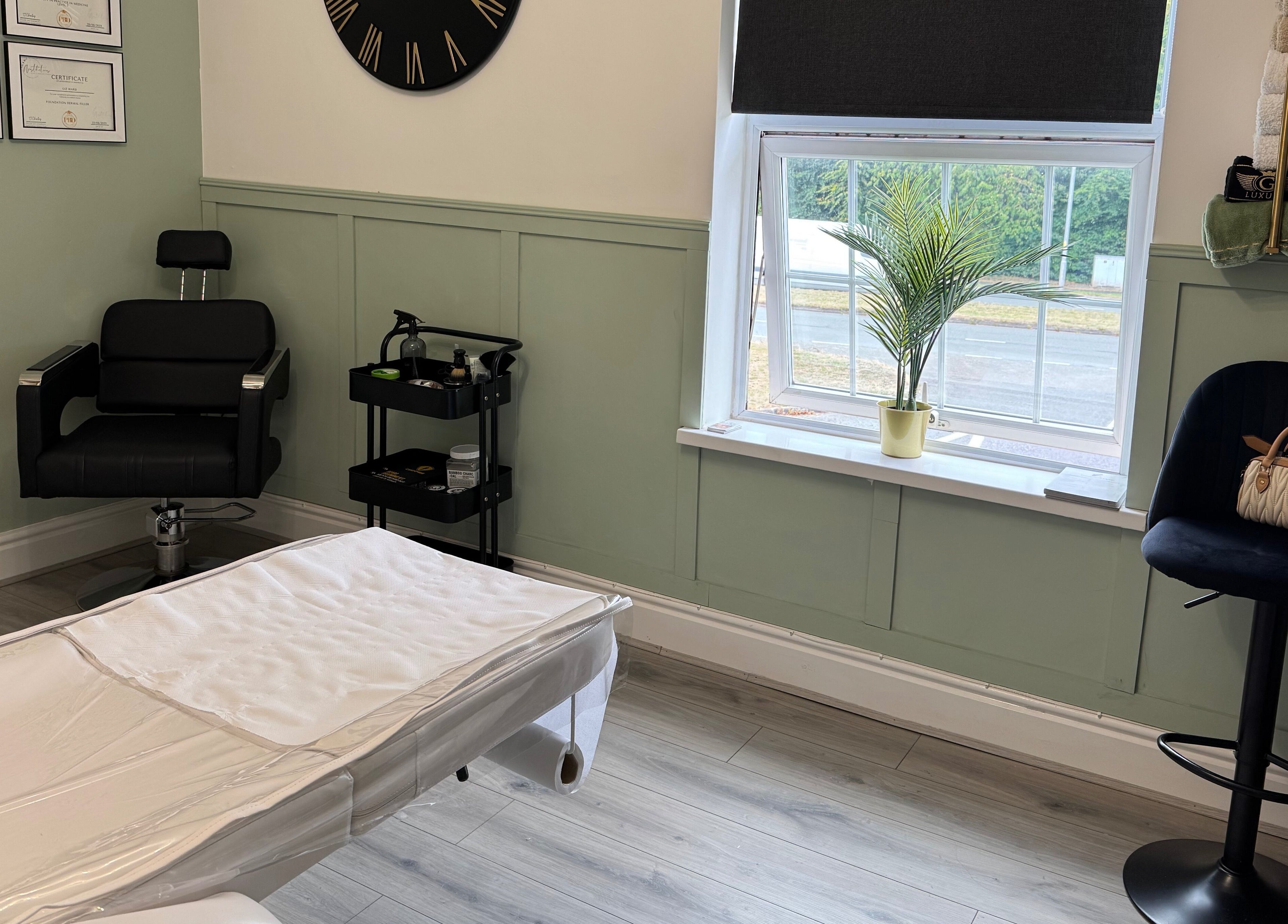 Calming treatment room at Saving Face Aesthetics & Beauty, Warrington, England, GB with a spa chair and window view.