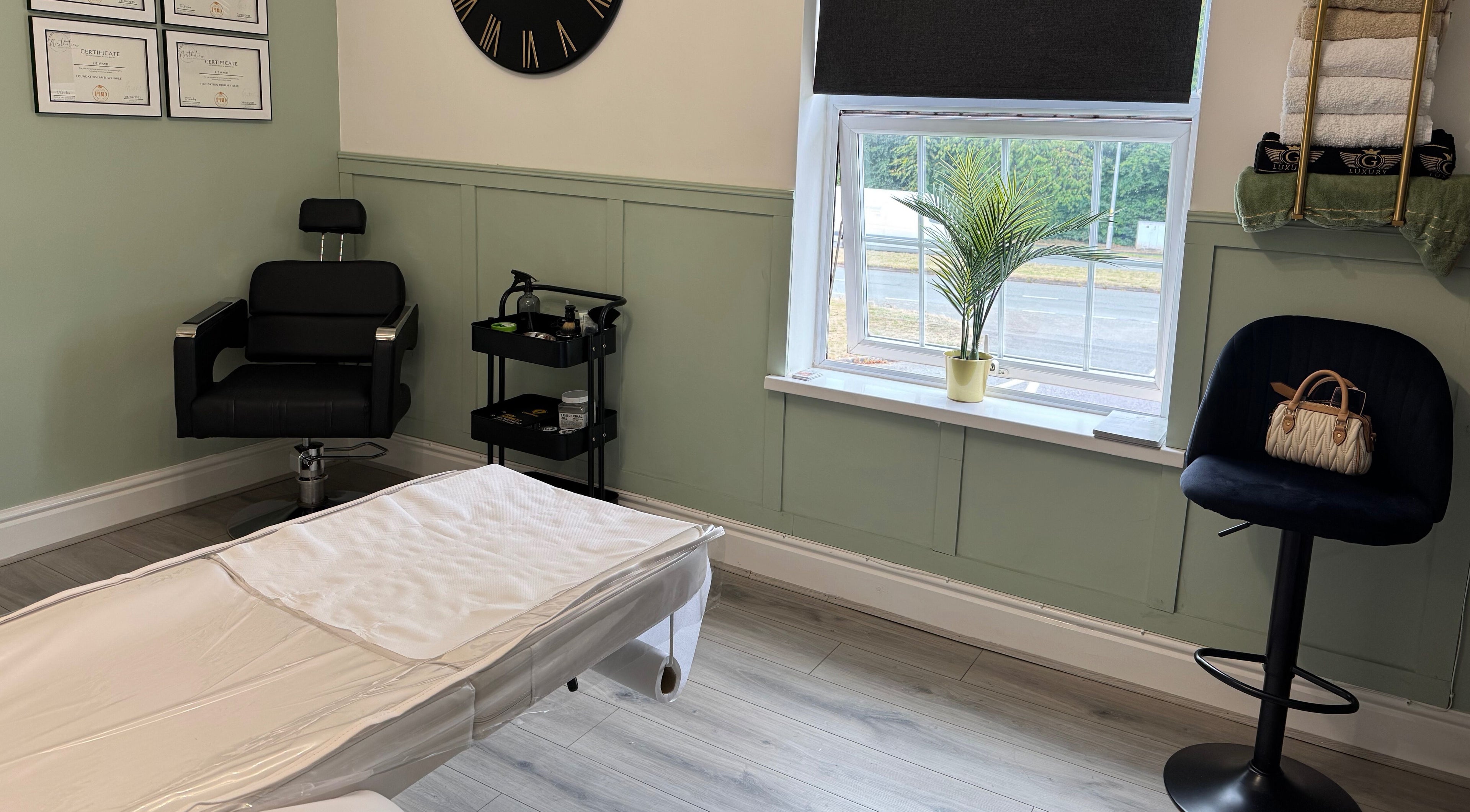 Calming treatment room at Saving Face Aesthetics & Beauty, Warrington, England, GB with a spa chair and window view.