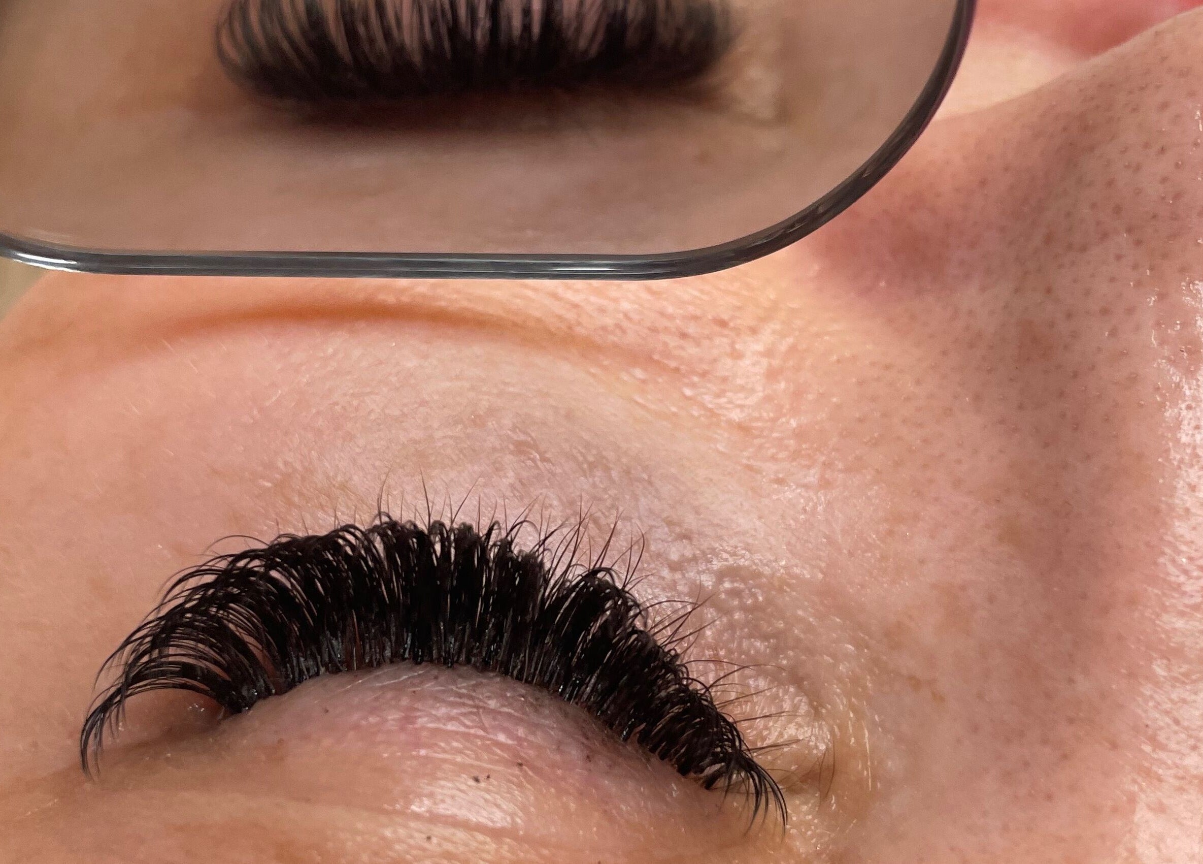 Close-up of full lashes at Samantha Jayne Lash Atelier, Camperdown, New South Wales, AU in mirror reflection.