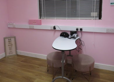 Charming pink beauty room at Enchanted By Em, Narborough, England, GB with nail table and decor.