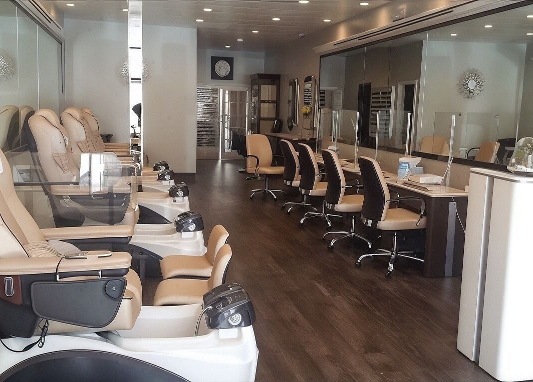 Luxurious interior of T Nail Salon in Santa Clara, California, US, featuring comfortable pedicure chairs.