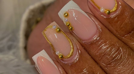 Elegant nail art with gold accents at Okuryangava, Windhoek, Khomas Region, NA.