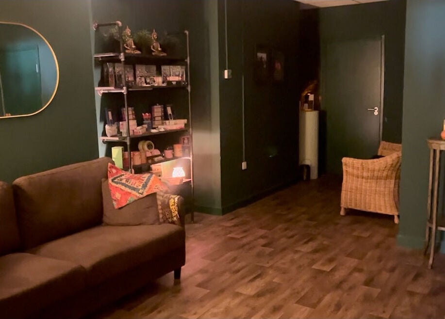 Warm, inviting lounge area at Spa & Skin Lounge, Hastings, England, GB with comfortable seating and ambient lighting.