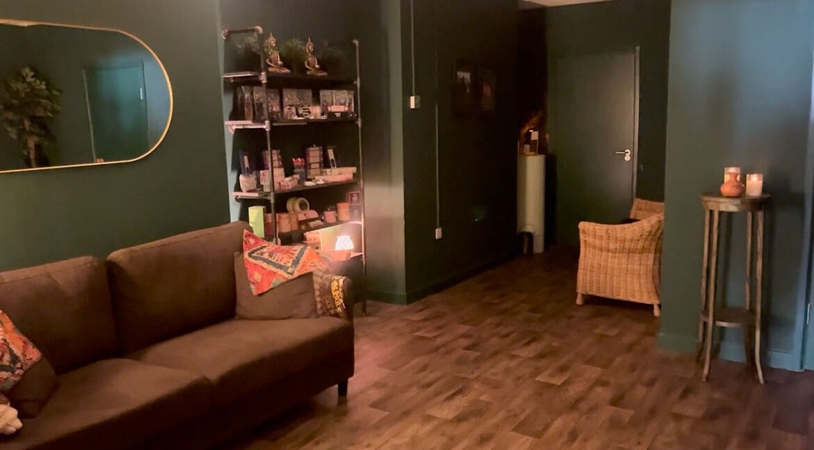 Warm, inviting lounge area at Spa & Skin Lounge, Hastings, England, GB with comfortable seating and ambient lighting.