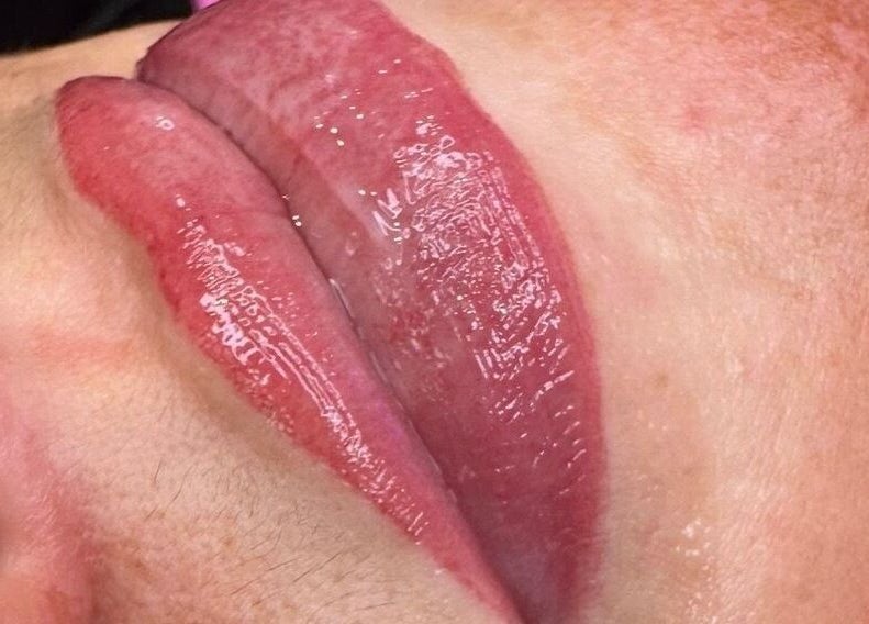 Close-up of glossy lips at Spa & Skin Lounge, Hastings, England, GB.