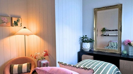 Relaxing treatment room at Babotanics Boutique, Paddington, Queensland, AU with elegant decor and soft lighting.