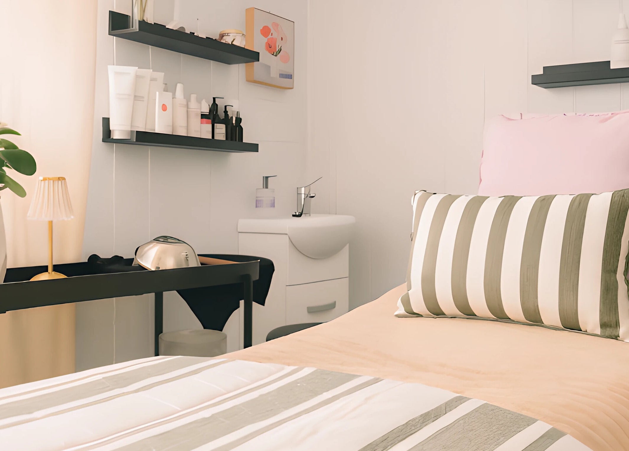 Tranquil treatment room at Babotanics Boutique, Paddington, Queensland, AU, featuring cozy decor and essentials.