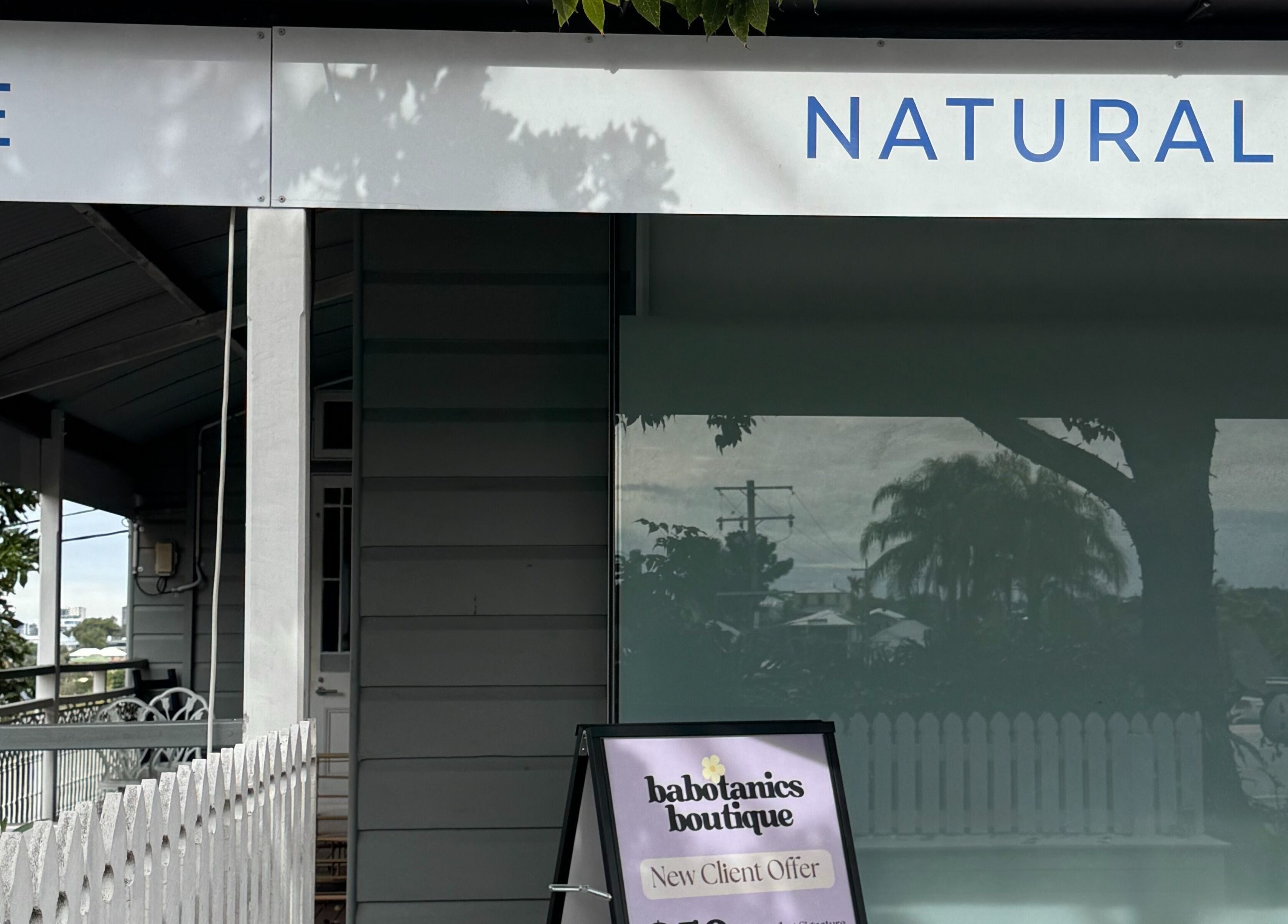 Babotanics Boutique entrance in Paddington, Queensland, AU showcasing the welcoming sign and charming facade.