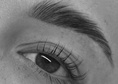 Close-up of expertly shaped eyebrow and lashes at Aura Aesthetics, Thornlands, Queensland, AU.