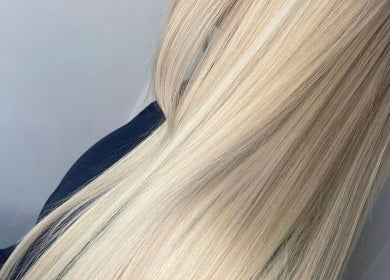 Sleek blonde hair transformation at Molly Grace Hair, Market Bosworth, England, GB.