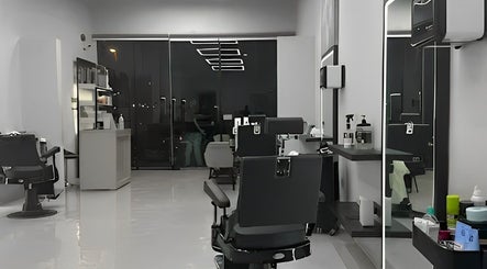 Chic interior of The Protocol Barbershop in Riyadh, Riyadh Province, SA, featuring modern barber chairs and sleek decor.