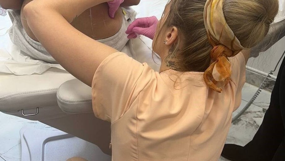 Beauty specialist performing a body treatment at Modern Goddess Zone, Brighton And Hove, England, GB.