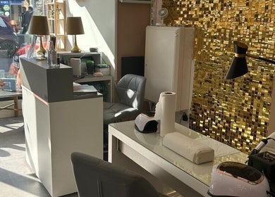Modern Goddess Zone's chic interior with gold decor in Brighton And Hove, England, GB. Relaxing and stylish space.