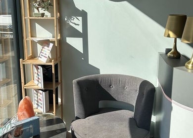 Tranquil waiting area at Modern Goddess Zone, Brighton And Hove, England, GB with elegant decor and soft lighting.