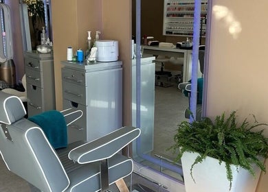 Stylish salon chair at Modern Goddess Zone in Brighton And Hove, England, GB with elegant decor.