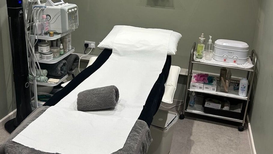 Modern Goddess Zone treatment room in Brighton And Hove, England, GB with a cozy therapy bed and spa essentials.