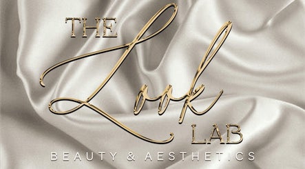 The Look Lab Salon's elegant logo on silk background, featuring G Louise Lashes, Yarm, England, GB.