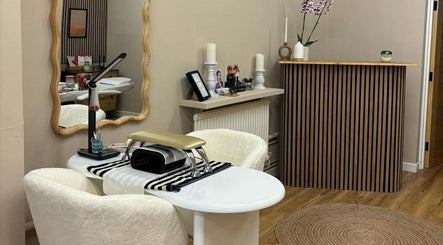 Elegant nail station in The Olive Room Hereford, Hereford, England, GB with cozy chairs and stylish decor.