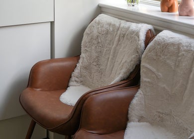 Comfortable leather chairs with plush blankets at SB Cosmetics Clinic, Glasgow, Scotland, GB.