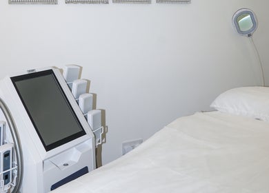 Modern treatment room at SB Cosmetics Clinic in Glasgow, Scotland, GB with advanced aesthetic equipment.