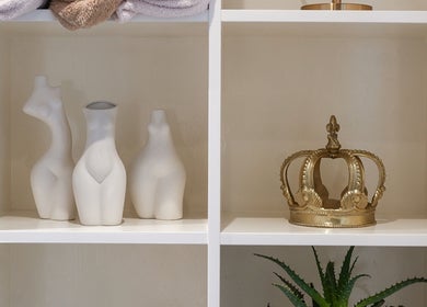 Chic display at SB Cosmetics Clinic, Glasgow, Scotland with ceramic vases and a golden crown.