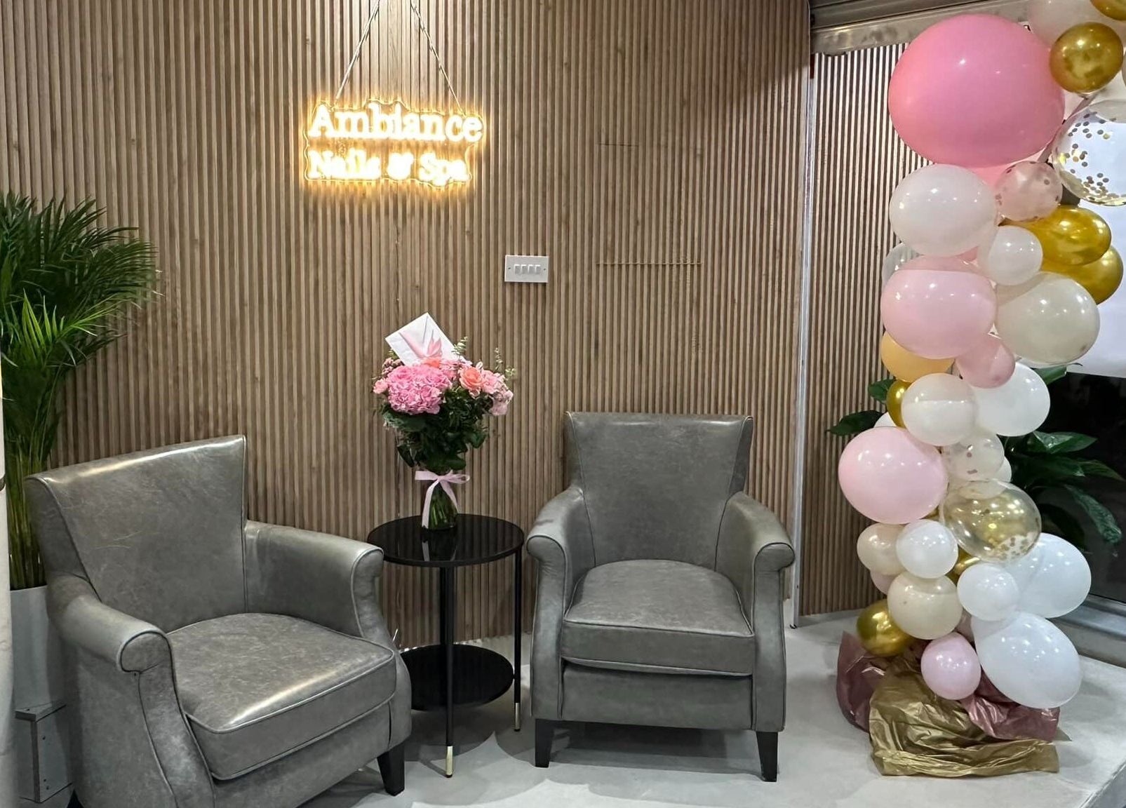 Elegant seating area with chairs and balloons at Ambiance Nails & Spa, Naas, County Kildare, IE.