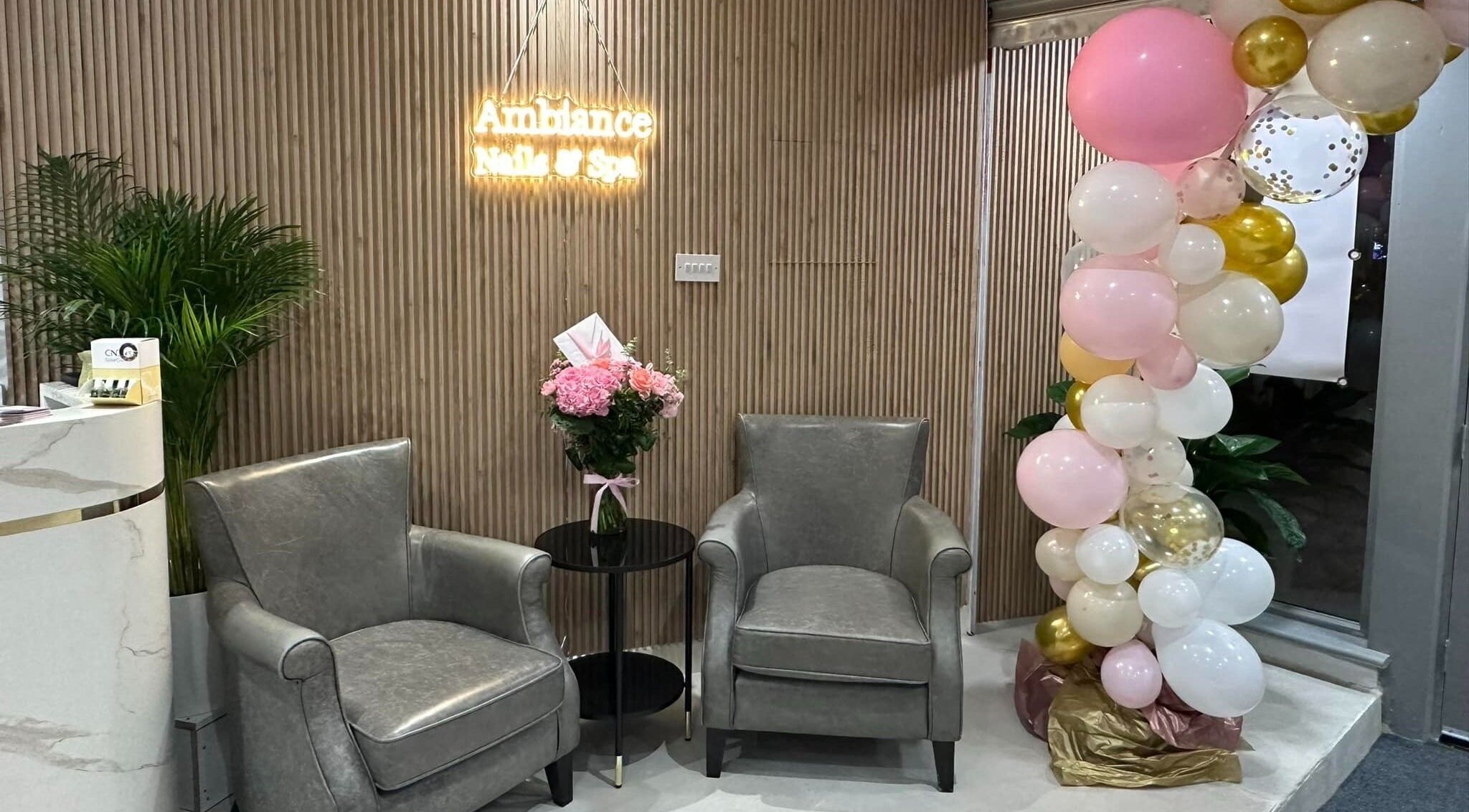 Elegant seating area with chairs and balloons at Ambiance Nails & Spa, Naas, County Kildare, IE.