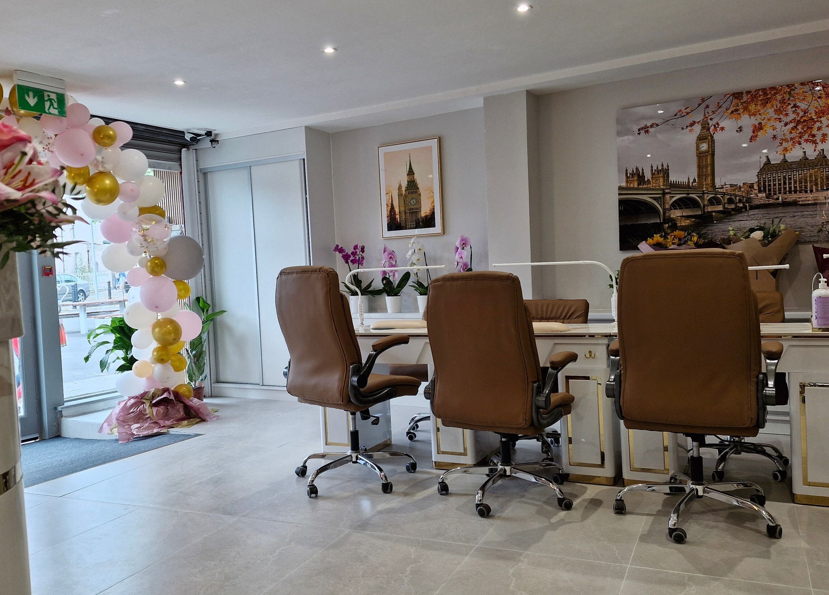 Inviting interior of Ambiance Nails & Spa in Naas, County Kildare, IE. Features elegant chairs and decor.