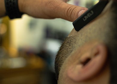 Close-up of a precision haircut at DG barbershop, Guildford, England, GB.