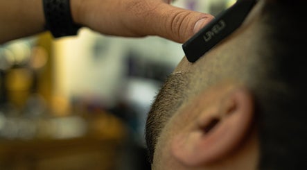 Close-up of a precision haircut at DG barbershop, Guildford, England, GB.