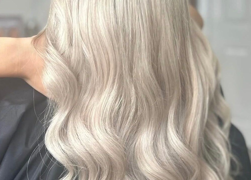 Silvery blonde hair styled in waves at Ruby Alice Hair, Broughton, England, GB.