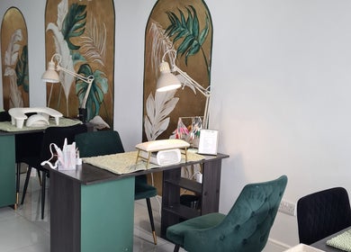 Elegant manicure station at Waxing Crescent in Willington, England, GB with stylish decor and ambient lighting.