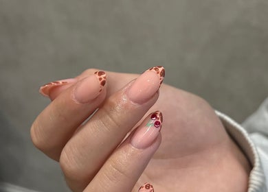 Elegant nail art with floral accents at Beauty Muse (BLEND) in Skewen, Wales, GB.