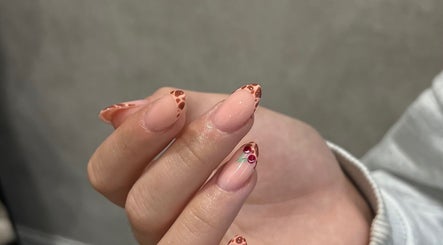 Elegant nail art with floral accents at Beauty Muse (BLEND) in Skewen, Wales, GB.
