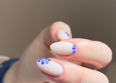 Close-up of elegant blue nail art at Beauty Muse (BLEND), Skewen, Wales, GB.