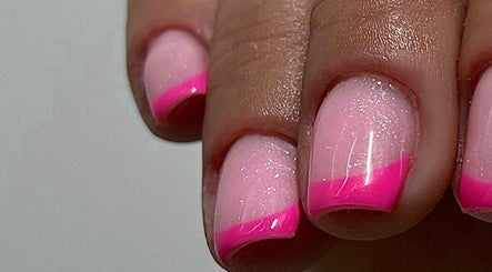 Pink glitter nails with vibrant tips at Beauty Muse (BLEND), Skewen, Wales, GB.