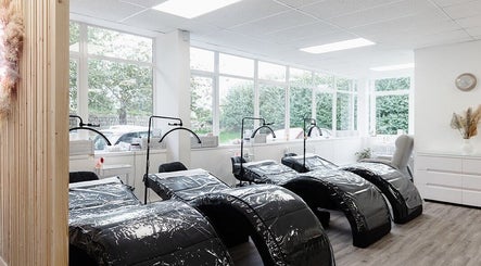 Relaxing spa beds at Laura Bell Salon, Falmouth, England, GB, offering top wellness treatments.
