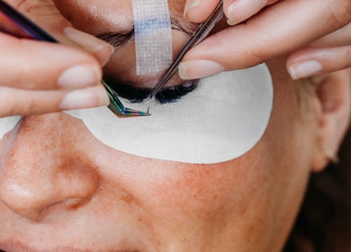 Eyelash extensions being applied at Laura Bell Salon, Falmouth, England, GB.