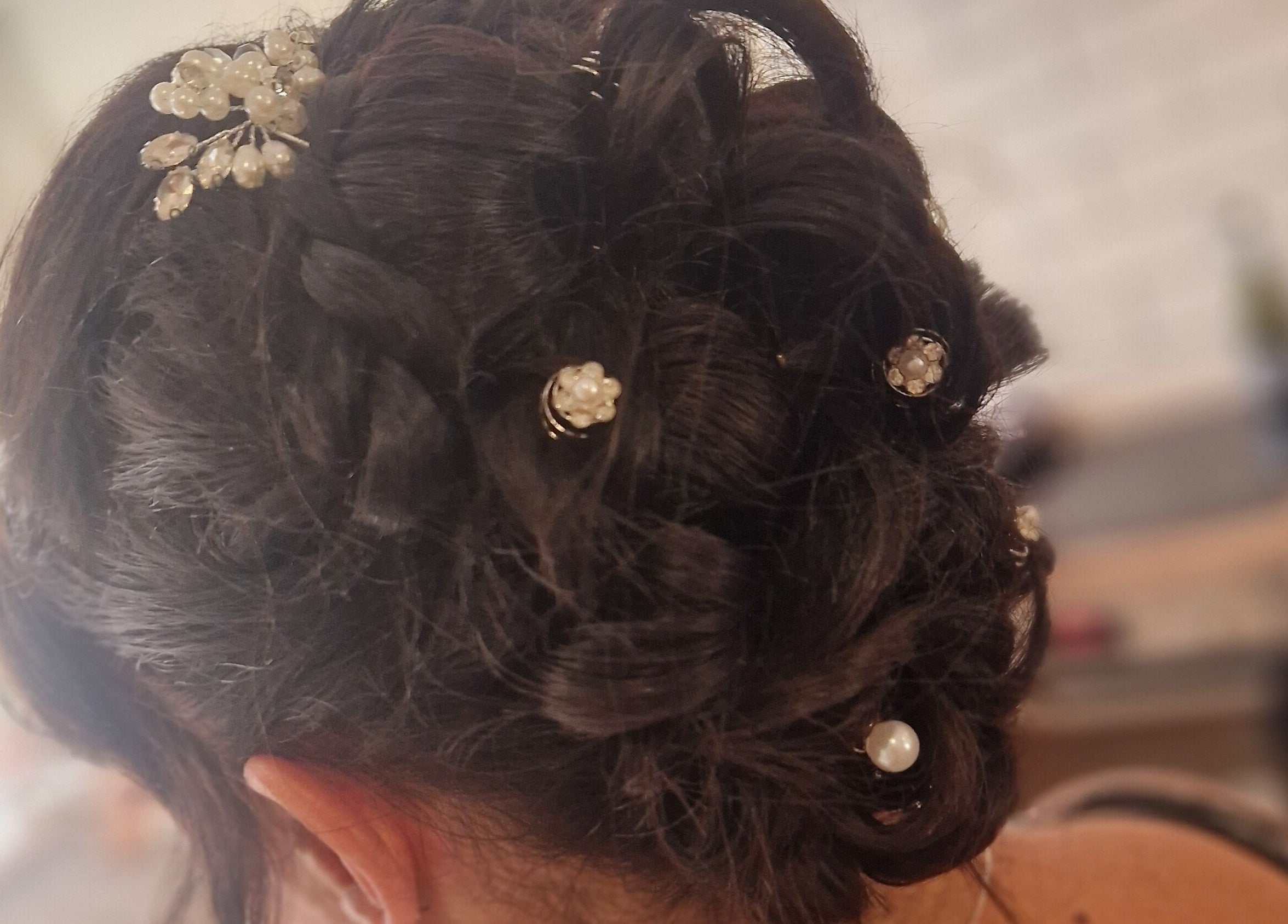 Elegant braided hair with pearl pins from Style n Smile Hair By Donna, Bruton, England, GB.