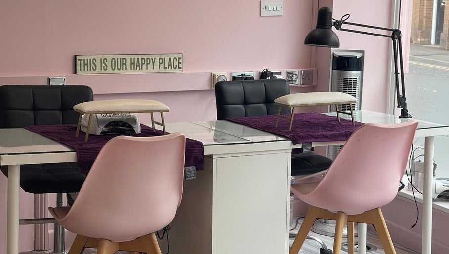 Chic nail station at Lilybelle Beauty and Nails, Market Harborough, England, GB, featuring pink decor.