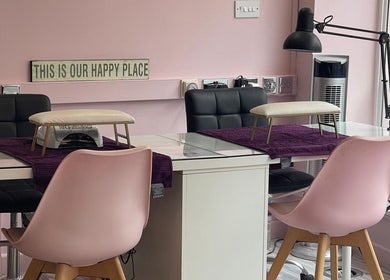 Chic nail station at Lilybelle Beauty and Nails, Market Harborough, England, GB, featuring pink decor.