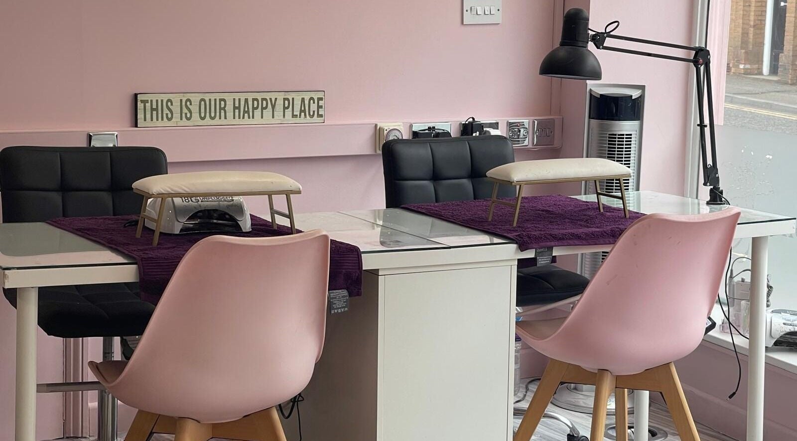 Chic nail station at Lilybelle Beauty and Nails, Market Harborough, England, GB, featuring pink decor.