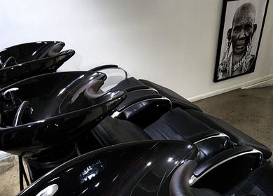 Luxurious wash stations at Suede Hair Skin Body, Cairns City, Queensland, AU offering premium hair services.