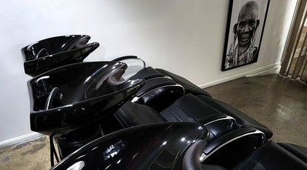 Luxurious wash stations at Suede Hair Skin Body, Cairns City, Queensland, AU offering premium hair services.