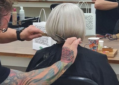 Professional haircut at Suede Hair Skin Body, Cairns City, Queensland, AU, showcasing precise styling.