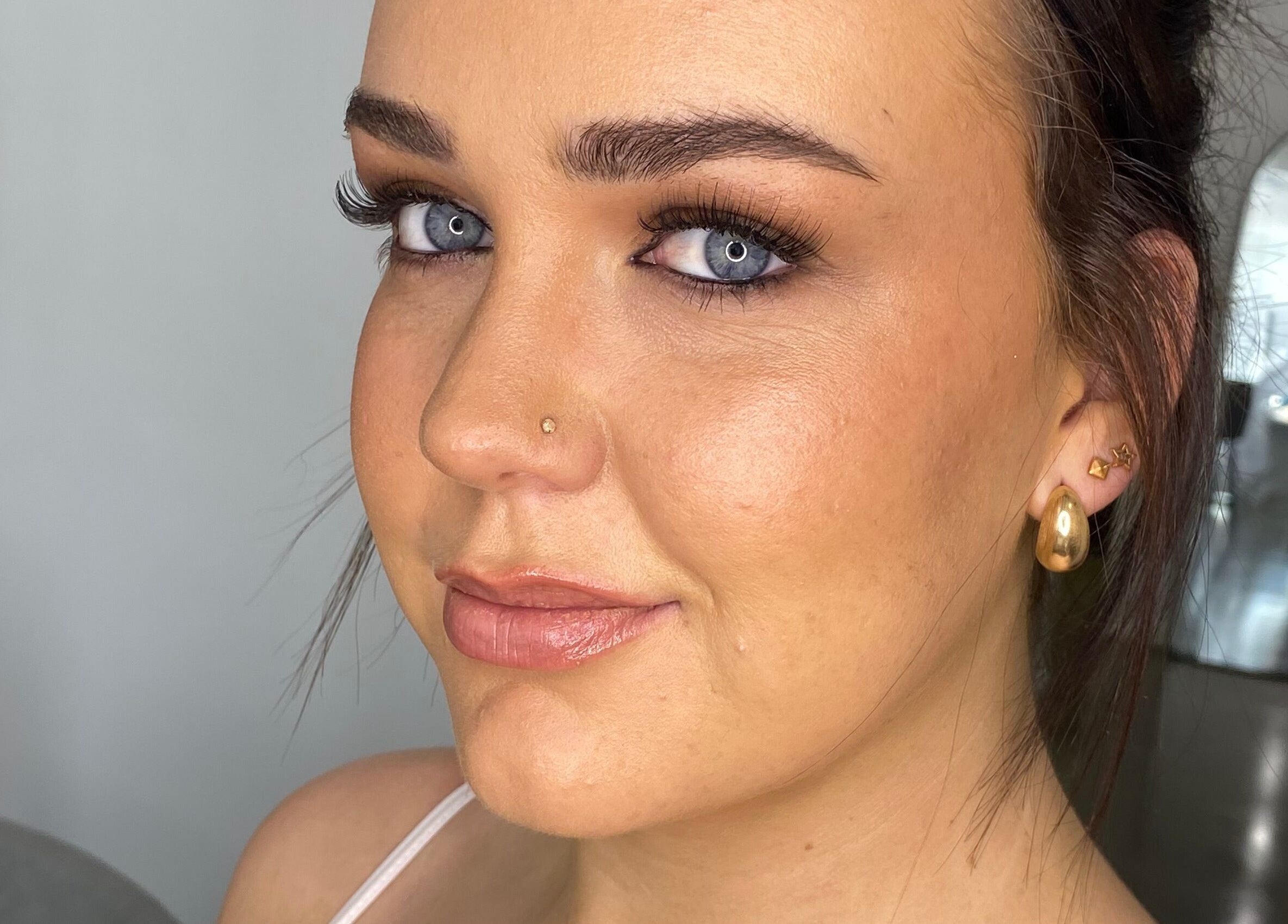 Close-up of a woman's radiant makeup at Sketchd the Studio - Point Cook, Melbourne, Victoria, AU.