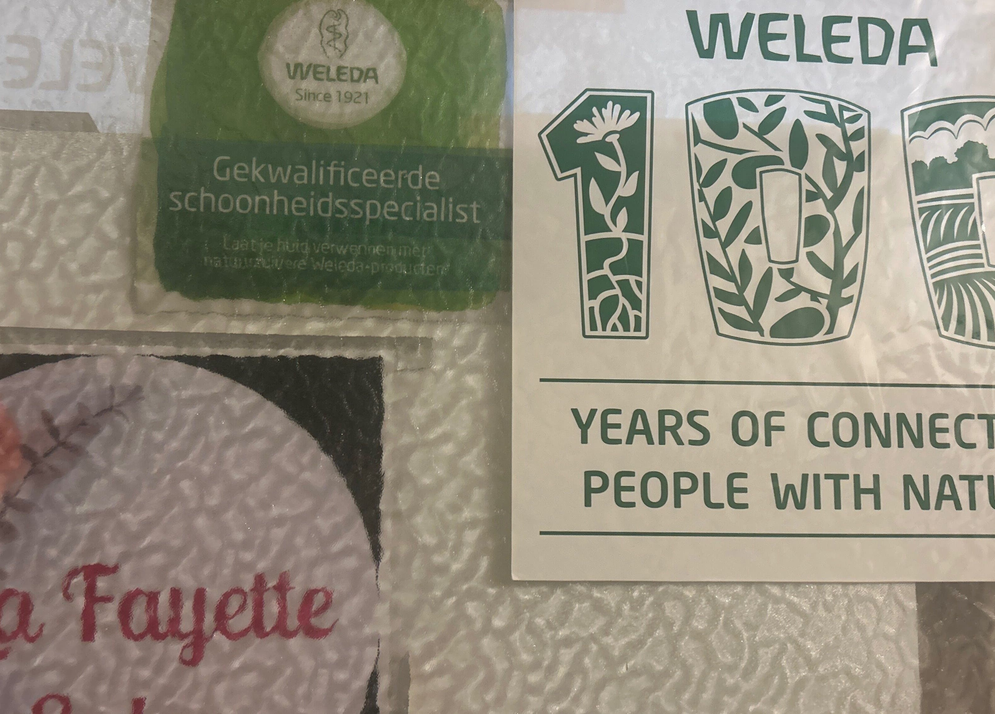 Weleda certificaat en LaFayette Salon logo in Heerlen, Limburg, NL met 100 jaar natuurverbinding banner.