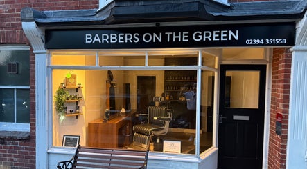 Exterior of Barbers on the Green Rowlands Castle, stylish shopfront in Rowlands Castle, England, GB.