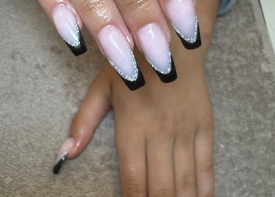 Elegant black and silver nail design at Essence - Nails | Beauty | Skin, Warrington Town Centre, England, GB.